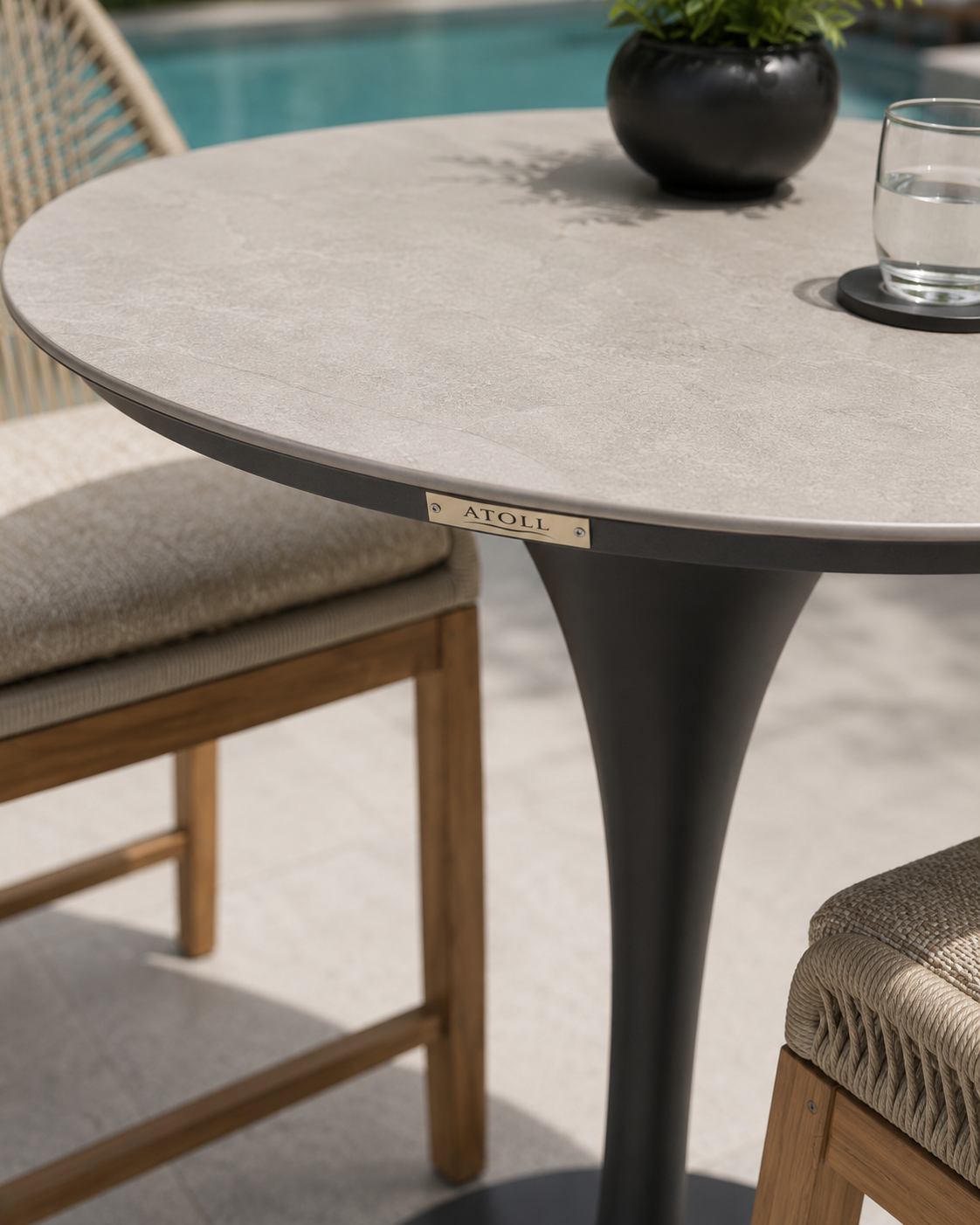 Cayo 43 in Bar High Table by Atoll – Charcoal frame and synthetic stone top