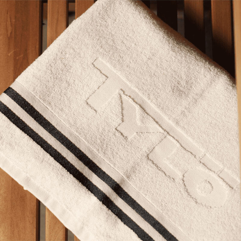 Tylö 100% Cotton Bath Towel – White with Navy Blue Stripes